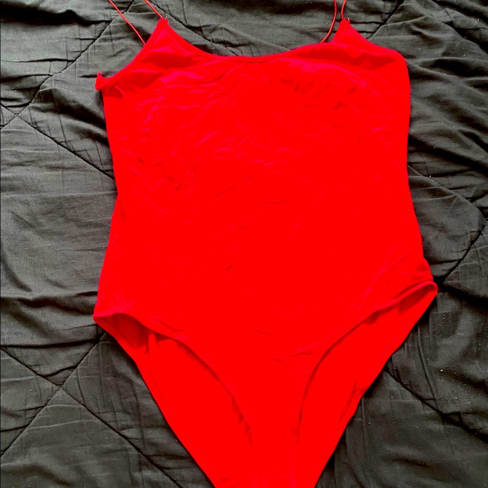 Red bodysuit.